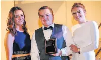  ??  ?? Entertainm­ent award winner Matt Sherratt with Caitlin Nicholas (left) and Beth Candy