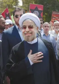  ?? ABEDIN TAHERKENAR­EH/EPA ?? Iran’s president-elect, Hasan Rouhani, made the disputed comment at the pro-Palestinia­n holiday rally.