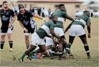  ?? Picture: WERNER HILLS ?? CLEARING OUT: Lulama Mkwenkwe on the move for Spring Rose during their EPRU Grand Challenge club rugby match against Park at the New Brighton Oval on Saturday