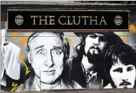  ??  ?? „ Mural at the Clutha Bar, Glasgow, site of the helicopter crash.