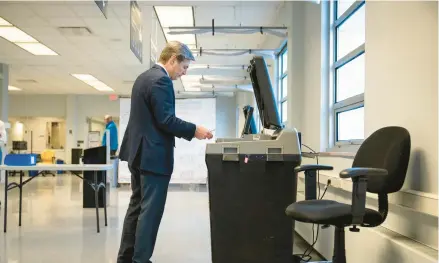  ?? DREW ANGERER/GETTY ?? Ohio state Sen. Matt Dolan, a Republican candidate for U.S. Senate in Ohio, votes early in the primary election on April 28 in Cleveland.