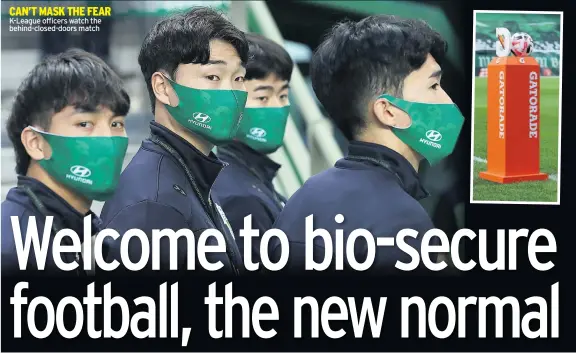  ??  ?? K-League officers watch the behind-closed-doors match