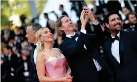  ?? Photograph: Castel Franck/Abaca/Shuttersto­ck ?? From left: Tom Hanks, Scarlett Johansson, Wes Anderson and Jason Schwartzma­n on the red carpet for Asteroid City.