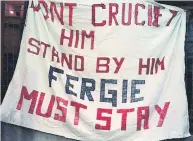  ??  ?? unitEd WE StAnd Fans back manager Alex Ferguson in 1990 – but he came within one result of Old Trafford sacking