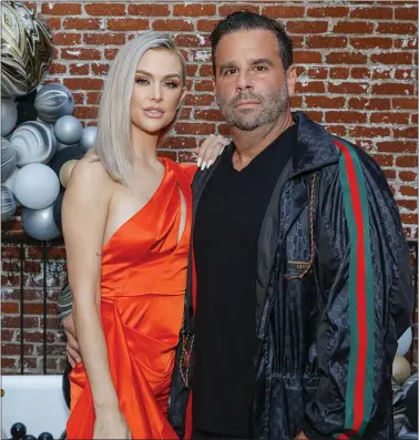  ?? AMY SUSSMAN — GETTY IMAGES/TNS ?? Lala Kent and Randall Emmett attend the “Give Them Lala Beauty” party hosted by Lala Kent of “Vanderpump Rules” at Beauty & Essex on in 2021 in Los Angeles, California.