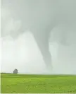  ??  ?? Craig Hilts had his camera ready as another twister touched down near Lafleche on Saturday.