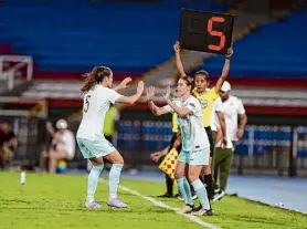  ?? ?? San Francisco native McKenna Whitham, right, made soccer history when she became, at age 13, the youngest person to score — and play — in an NWSL match of any type in preseason action Feb. 28.