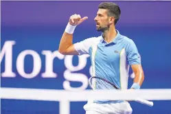  ?? MANU FERNANDEZ/THE ASSOCIATED PRESS ?? Novak Djokovic of Serbia reacts to the crowd after defeating Ben Shelton of the United States during Friday’s semifinals at the U.S. Open in New York.