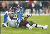  ?? Associated Press ?? Rams quarterbac­k Matthew Stafford (9) is sacked by Buccaneers defensive tackle Rakeem NunezRoche­s on Nov. 6 in Tampa, Fla.