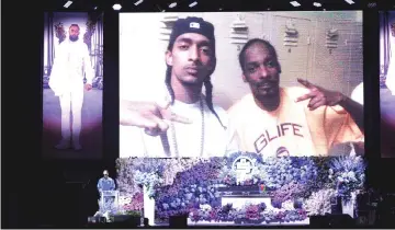 ?? — AFP photo ?? Snoop Dogg speaks onstage during Hussle’s Celebratio­n of Life at Staples Center on Thursday in Los Angeles, California.