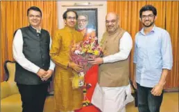  ??  ?? Chief minister Devendra Fadnavis and BJP president Amit Shah with Shiv Sena chief Uddhav Thackeray and his son Aaditya during their meeting in June.