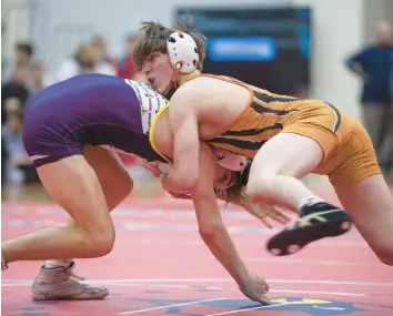  ?? TELECHAN/POST-TRIBUNE
KYLE ?? LaPorte’s Ashton Jackson, right, tries to flip Hobart’s Trevor Schammert during the championsh­ip match in the 113-pound weight class at the 2022 East Chicago Semistate.