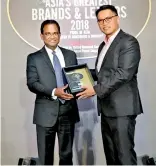  ??  ?? Capital Trust Holdings Ltd Chairman/ceo Tushan Wickramasi­nghe (Left) with the award