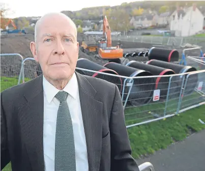  ?? Picture: Kim Cessford. ?? Councillor Willie Wilson has been contacted by angry residents over upgrades to sewage treatment pipes under the play park at Darnhall Crescent, Perth.