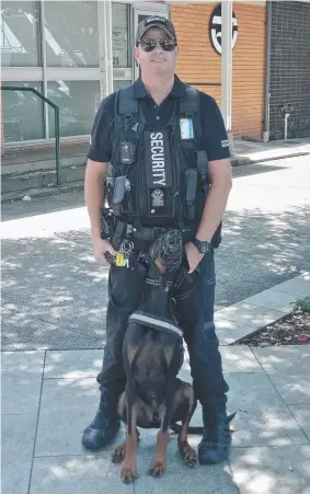  ??  ?? Wayne Heneker of Gold Coast Patrol Dogs K9 Security on the beat outside the Uniting Church in Short St, an area often frequented by abusive vagrants.