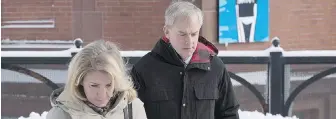  ??  ?? Dennis Oland and his wife, Lisa, arrive at the Law Courts in Saint John, N.B.