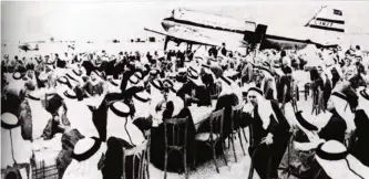  ?? —KUNA ?? KUWAIT: This March 16, 1954 photo shows Kuwaitis participat­inge in a celebratio­n held for the receiving the Kadhema aircraft at the old airport in the Nuzha area.