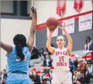  ?? JAMES BEAVER — FOR MEDIANEWS GROUP ?? Upper Dublin’s Jess Polin (15) gets a three-point shot off over North Penn’s Valerie McGriff (30) during the District 1-6A fifth place game on Friday, Feb. 28, 2020.