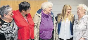  ?? IIS PHOTO ?? Family and Human Services Minister Tina Mundy, second right, chats with caregivers who will benefit from the Grandparen­ts and Care Providers program, which begins Dec. 1 on Prince Edward Island. From left, Jackie Agnew, Cynthia Poirier, Jean Torok,...