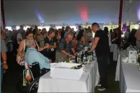  ?? FILE PHOTO ?? People were able to try many different foods and wines during the 16th annual Saratoga Wine and Food Festival in 2016 at the Saratoga Performing Arts Center.