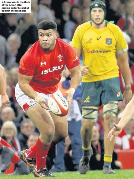  ??  ?? > Brown was in the thick of the action after coming on for his debut against the Wallabies