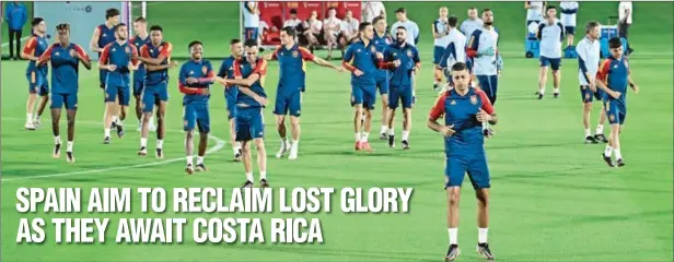  ?? (AFP) ?? Spain’s players attend a training session at the Qatar University Training ground in Doha on Tuesday, on the eve of their Qatar 2022 World Cup match against Costa Rica.