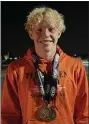  ?? SUBMITTED ?? Perkiomen Valley’s Jacob Replogle poses with his two medals after Saturday’s PIAA Swimming Championsh­ips.
