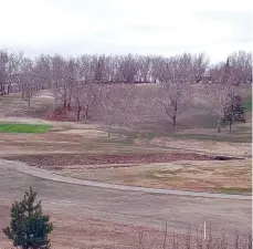  ??  ?? The Hillcrest Golf Club - here looking up the 10th hole and to the eighth green on Thursday afternoon opened for the season on Monday.