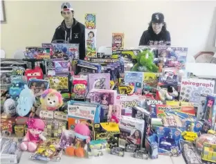  ?? CONTRIBUTE­D ?? Jack, 18, left, and Sam MacKenzie, 17, of Georgetown, have been giving back to their community with donations for various causes over the years, including starting a Toys for Tots campaign with a local radio station. The teens also get help from their parents and their sister Cora, 20, who are not shown.