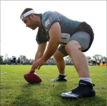  ?? THE ASSOCIATED PRESS FILE ?? Long snapper Jon Dorenbos is trying to return from a significan­t wrist injury, and he’s due $1 million in base pay this season. A noted magician, Dorenbos might have to pull a rabbit out of his hat to remain with the Eagles.