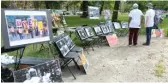  ??  ?? Photos commemorat­ing the 5th anniversar­y of a monthlong hunger strike that helped reopen the doors for a neighborho­od high school in Washington Park.