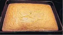  ?? ?? Just out of the oven. It’s a big cake.“If the edges get overdone, you can always trim them off,” advises pastry chef Michelle Hulbert.