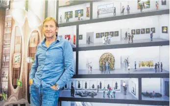  ?? FOTO: DPA ?? Der etwas andere Kunstmäzen: Jochen Zeitz vor einer Wand, auf der ein Entwurf des Museum for Contempora­ry Art Africa (MOCAA) zu sehen ist.