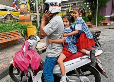  ?? — AFP ?? Uncertain future:
Children’s rights campaigner­s said school closures had drawn many migrant students into illegal, low-paid work just as the Covid-19 pandemic raises the risk of child labour.