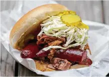  ?? Edward A. Ornelas / San Antonio Express-News ?? The Big Bro Sandwich is among the offerings at Two Bros.