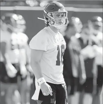  ?? Luis Sinco Los Angeles Times ?? JT DANIELS appeared to be the most poised of the Trojans’ four quarterbac­ks in a scrimmage Saturday.