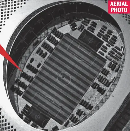  ??  ?? Military might: A satellite image that appears to show Chinese army vehicles in a sports stadium