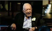  ?? JOHN BAZEMORE — THE ASSOCIATED PRESS FILE ?? Former President Jimmy Carter reacts as his wife, Rosalynn Carter, speaks during a reception to celebrate their 75th wedding anniversar­y on July 10, 2021, in Plains, Ga.