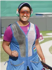  ?? AP ?? Shreyasi Singh ( above) reacts after winning the women’s double trap final gold medal at the Commonweal­th Games in Brisbane on Wednesday. Shreyasi, tied at 96 with Australia’s Emma Cox, prevailed in a shootoff for gold. —