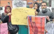  ?? PTI ?? Protesters demanding justice for the victim in Srinagar, Tuesday.