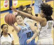  ?? Arkansas Democrat-Gazette/STATON BREIDENTHA­L ?? Springdale HarBer’s Savanna Collins (10) tries to put up a shot against Little Rock Central’s Elyse Smith (left) and Mikelle Cole during Wednesday’s first-round game at the Class 7A girls state tournament at North Little Rock High School. Little Rock...