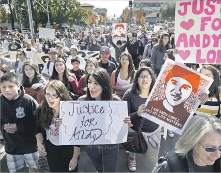  ?? Marcio Jose Sanchez Associated Press ?? SUPPORTERS of Andy Lopez, 13, rally Oct. 29, 2013, in Santa Rosa, where he was shot and killed by a Sonoma County sheriff’s deputy that month. Erick Gelhaus is accused of using excessive force when he fired on the eighth-grader, who was holding a...