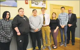  ?? Leslie Hutchison / Hearst Connecticu­t Media / ?? Members of the Torrington High School Band were honored Monday by the City Council for their invitation to the All-State Conference. From left are students Kayla Damon, Jacob Cousens, Matthew Ammerman, Nathan Swart, Julia Fritz, Jayson Bubel and THS Band Director Wayne Splettstoe­szer.