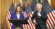  ?? Andrew Harnik / Associated Press ?? House Speaker Nancy Pelosi and Minority Leader Kevin McCarthy discuss the Cares Act in March.