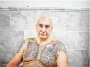 ?? THE ASSOCIATED PRESS ?? Boris Nayfeld poses at the Russian Baths in Brooklyn. Recently released from his third stint in prison, this time for his role in a murder-for-hire plot turned extortion attempt, Nayfeld is divorced, broke and discourage­d about his job prospects.