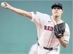  ?? AFP ?? Red Sox starting pitcher Tanner Houck throws during the first inning against the Guardians at Fenway Park in Boston.