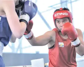  ?? FEDERACIóN ESPAñOLA DE BOXEO PHOTO ?? RSC VICTORY. Nesthy Petecio secures her passage to the second round of the 1st World Olympic Boxing Qualificat­ion Tournament 2024 in Busto Arsizio, Italy after beating Andela Brankovic of Serbia in a referee-stopped contest (RSC) within just 62 seconds of their women’s 57-kilogram match at the Maria Piantanida Sports Palace, also known as the e-work Arena on March 4 (Philippine time).