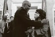  ?? Alex Brandon / Associated Press ?? After being sworn in, Gen. Charles Q. Brown Jr., the Air Force chief of staff, hugs his mother, Kay Brown, in the Oval Office.