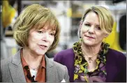  ?? GLEN STUBBE / STAR TRIBUNE ?? U.S. Sen. Tina Smith, D-Minn., (left) speaks beside Wyoming Machine Inc.’s Lori Tapani. Smith is preparing for a November election to keep her new job. She was appointed to replace Al Franken, who quit after sexual misconduct allegation­s.