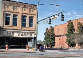  ?? Doug Walker / RN-T ?? The Vogue building at Broad Street and Third Avenue will become a special events facility run by Harvest Moon owner Ginny Kibler. She said windows cut into the first floor will give guests a beautiful view of the brickwork and fountain at Buddy...